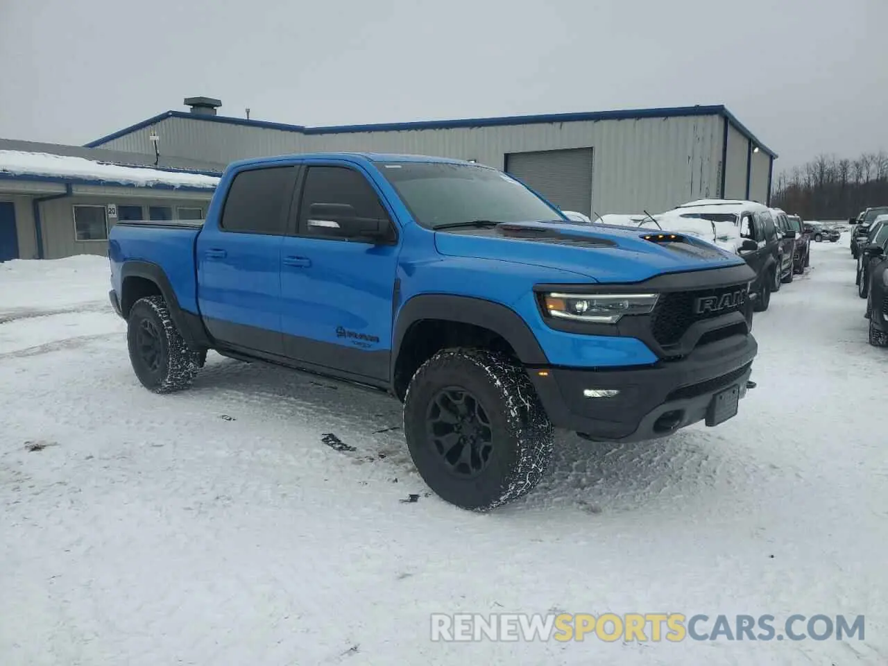 4 Photograph of a damaged car 1C6SRFU92NN346272 RAM 1500 2022