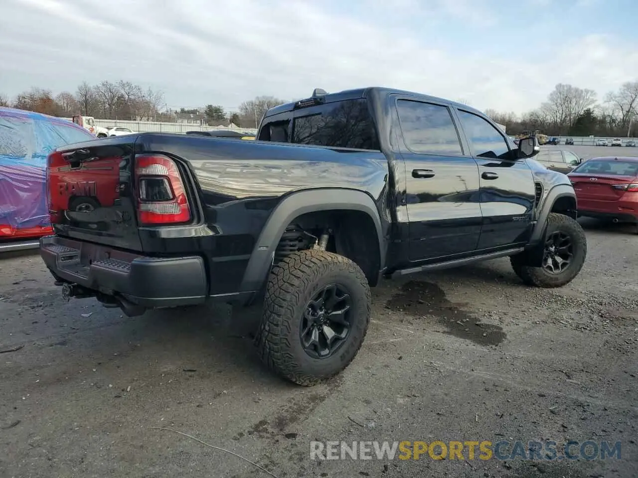 3 Photograph of a damaged car 1C6SRFU93NN252272 RAM 1500 2022