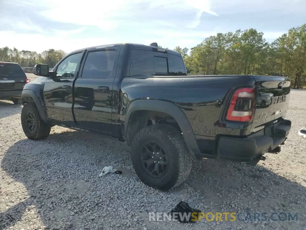2 Photograph of a damaged car 1C6SRFU93NN335250 RAM 1500 2022