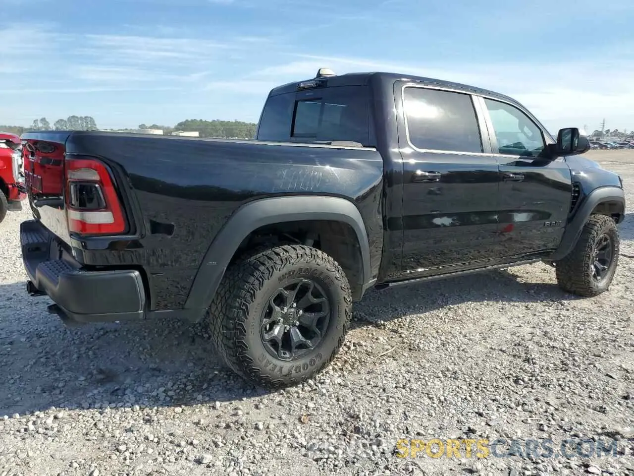 3 Photograph of a damaged car 1C6SRFU93NN335250 RAM 1500 2022