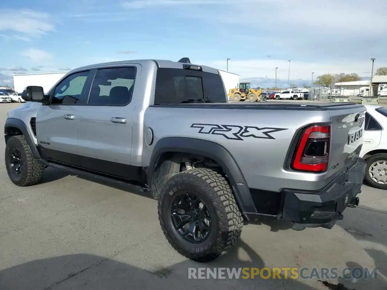 2 Photograph of a damaged car 1C6SRFU93NN402994 RAM 1500 2022