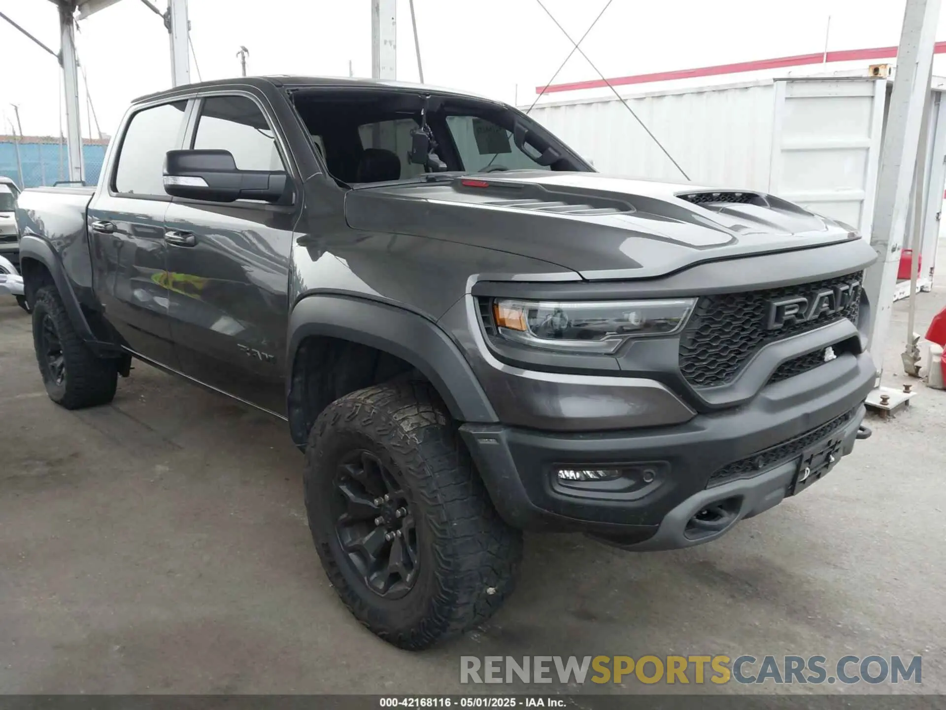 1 Photograph of a damaged car 1C6SRFU93NN415194 RAM 1500 2022