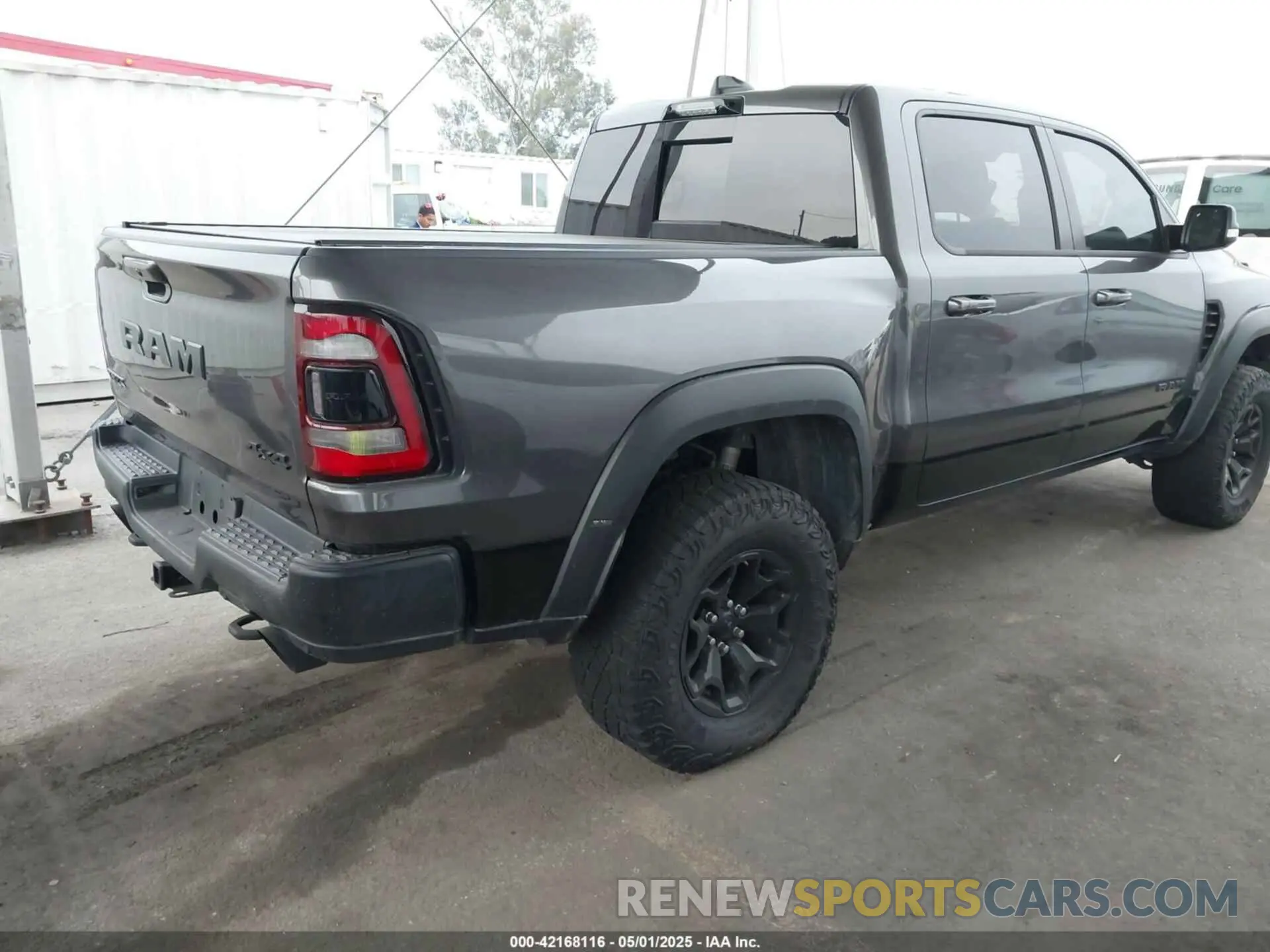 4 Photograph of a damaged car 1C6SRFU93NN415194 RAM 1500 2022