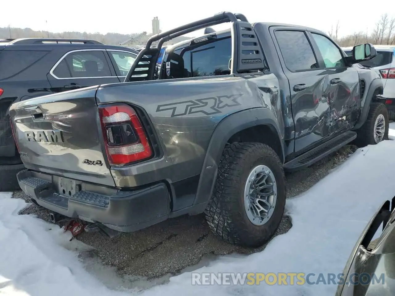 3 Photograph of a damaged car 1C6SRFU94NN101960 RAM 1500 2022