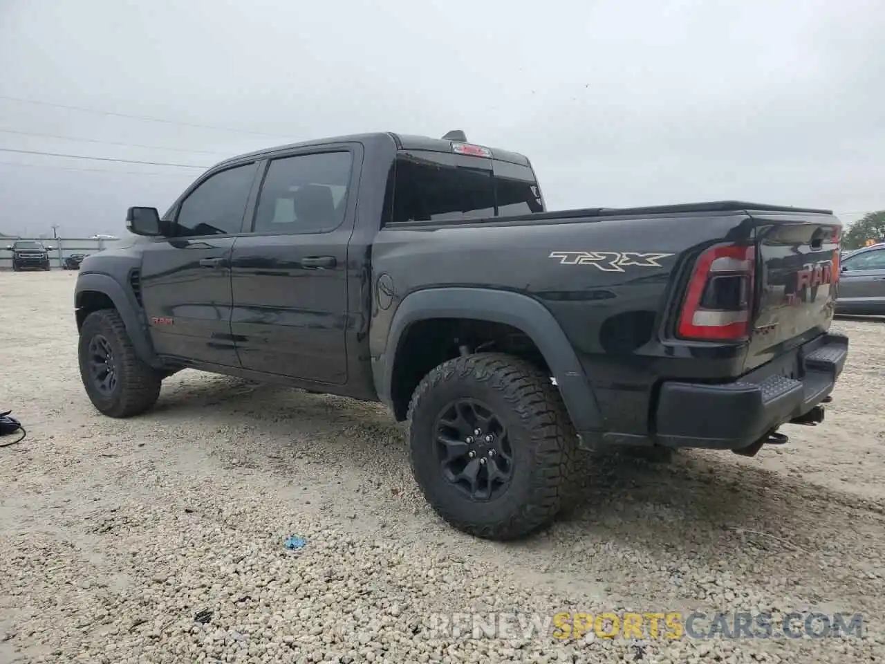 2 Photograph of a damaged car 1C6SRFU94NN116958 RAM 1500 2022