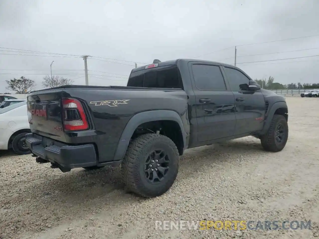 3 Photograph of a damaged car 1C6SRFU94NN116958 RAM 1500 2022