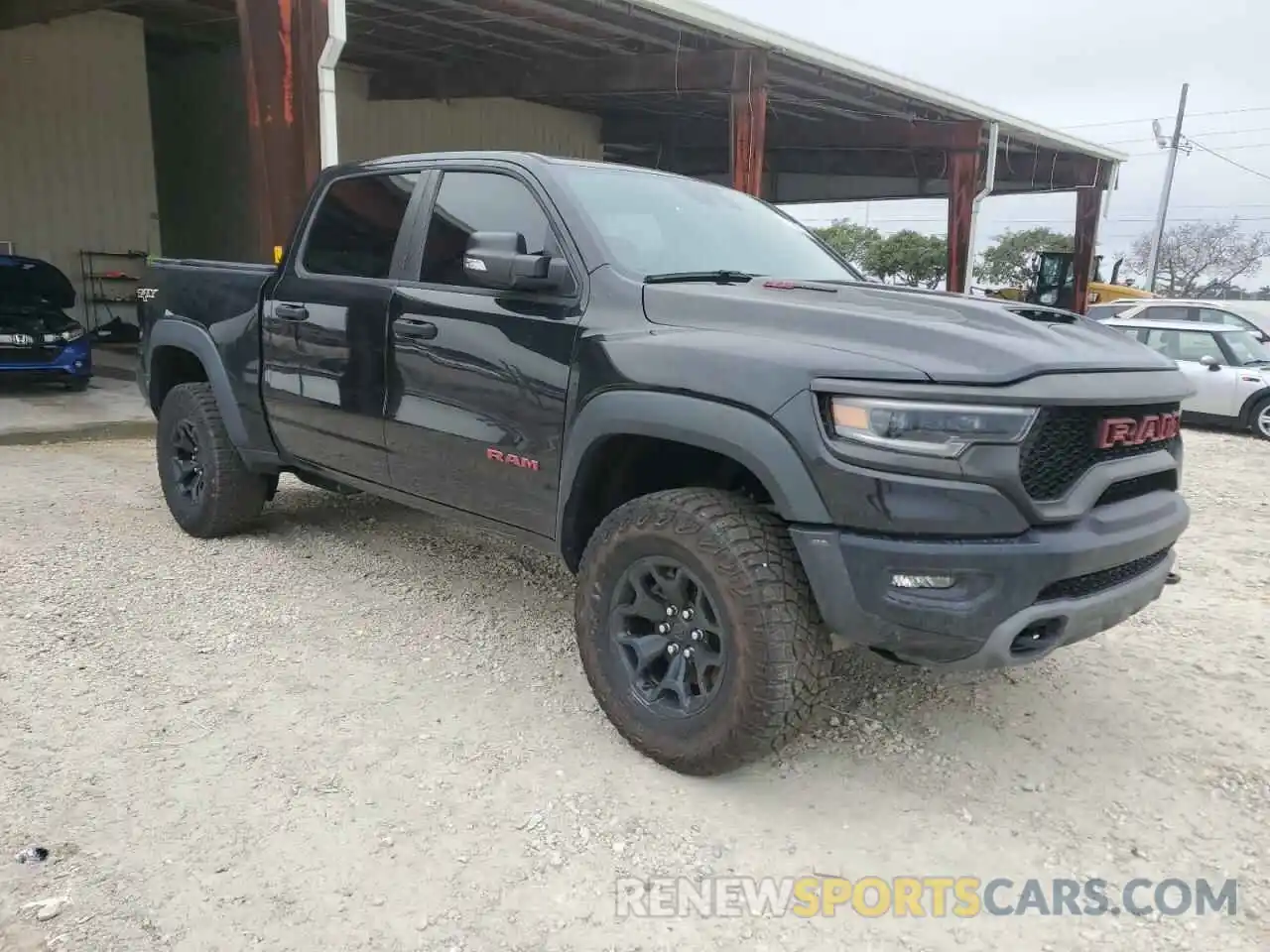 4 Photograph of a damaged car 1C6SRFU94NN116958 RAM 1500 2022