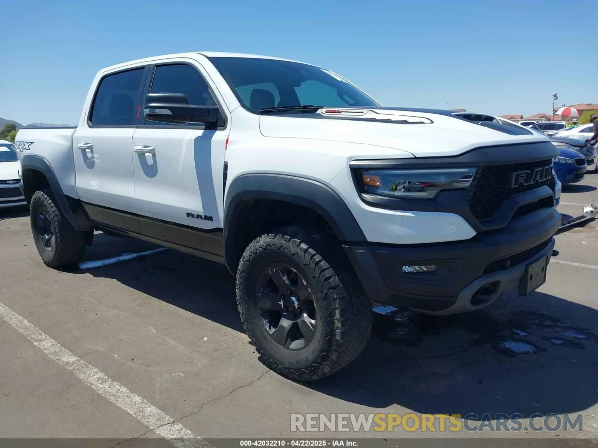 1 Photograph of a damaged car 1C6SRFU95NN245954 RAM 1500 2022