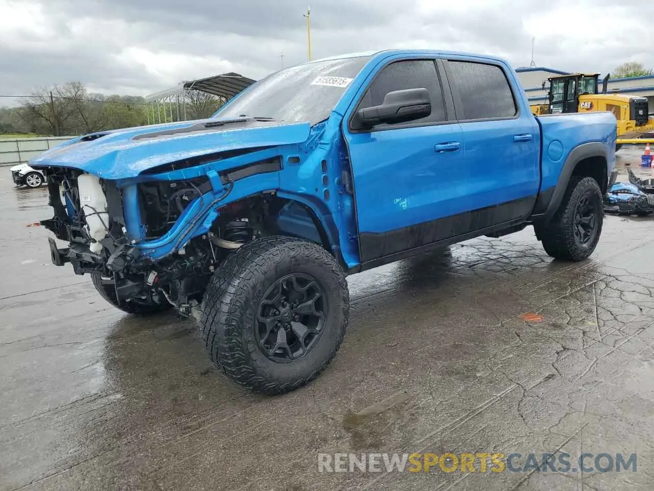 1 Photograph of a damaged car 1C6SRFU95NN322094 RAM 1500 2022