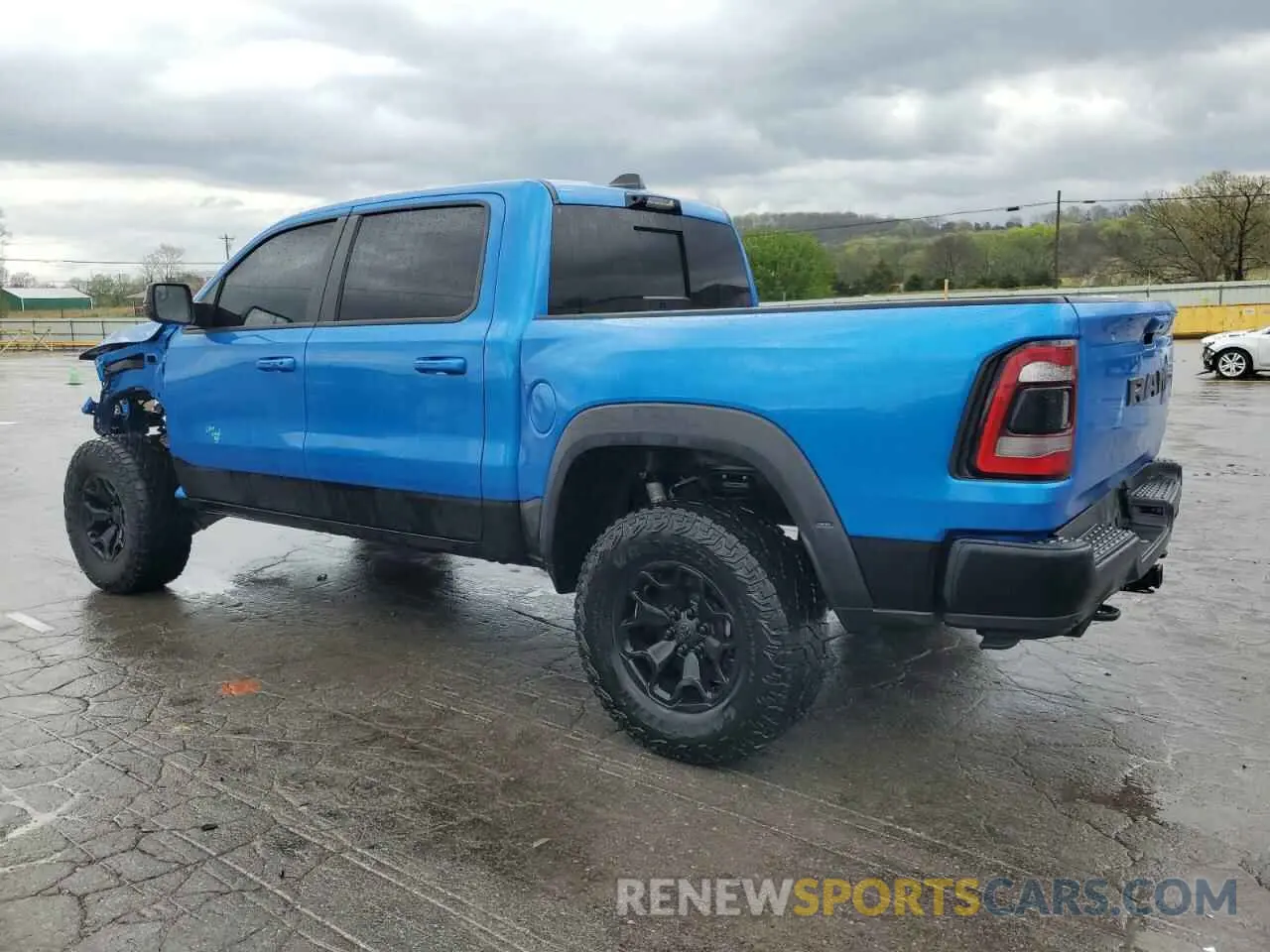 2 Photograph of a damaged car 1C6SRFU95NN322094 RAM 1500 2022