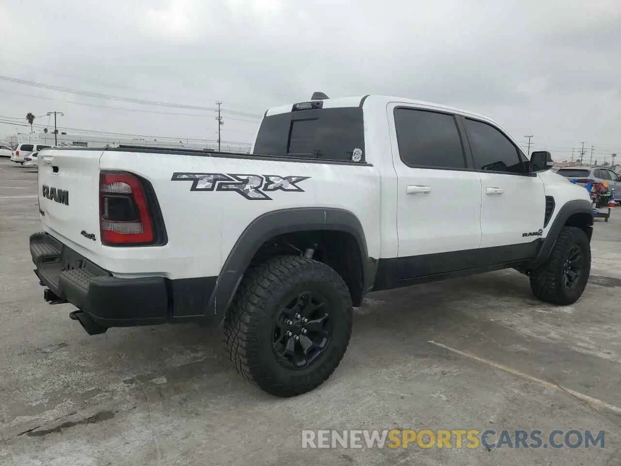3 Photograph of a damaged car 1C6SRFU95NN357489 RAM 1500 2022