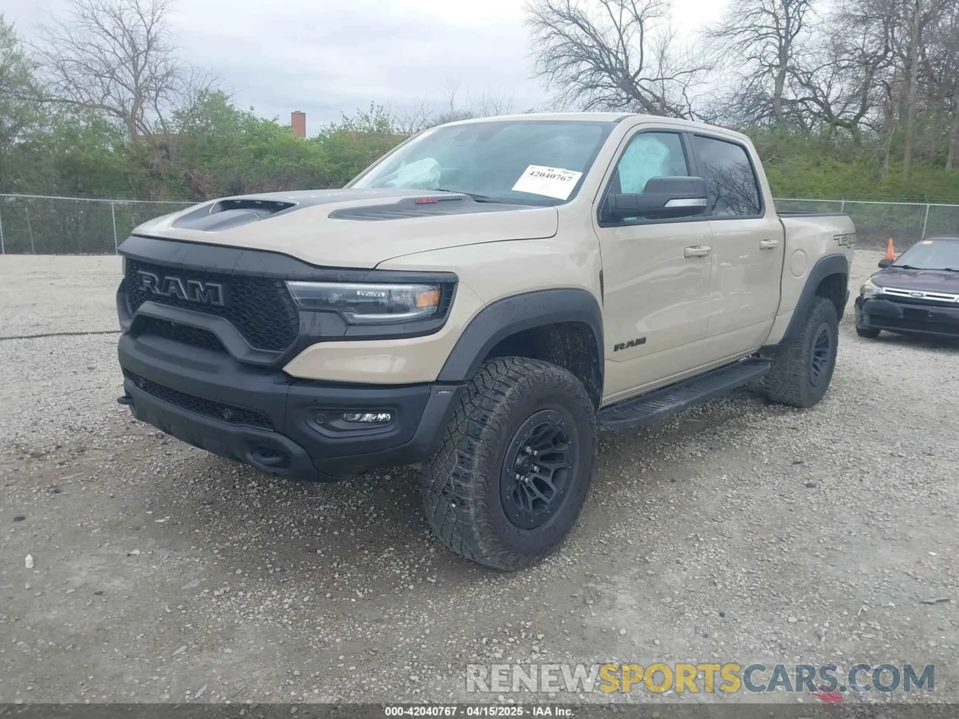 2 Photograph of a damaged car 1C6SRFU95NN399791 RAM 1500 2022