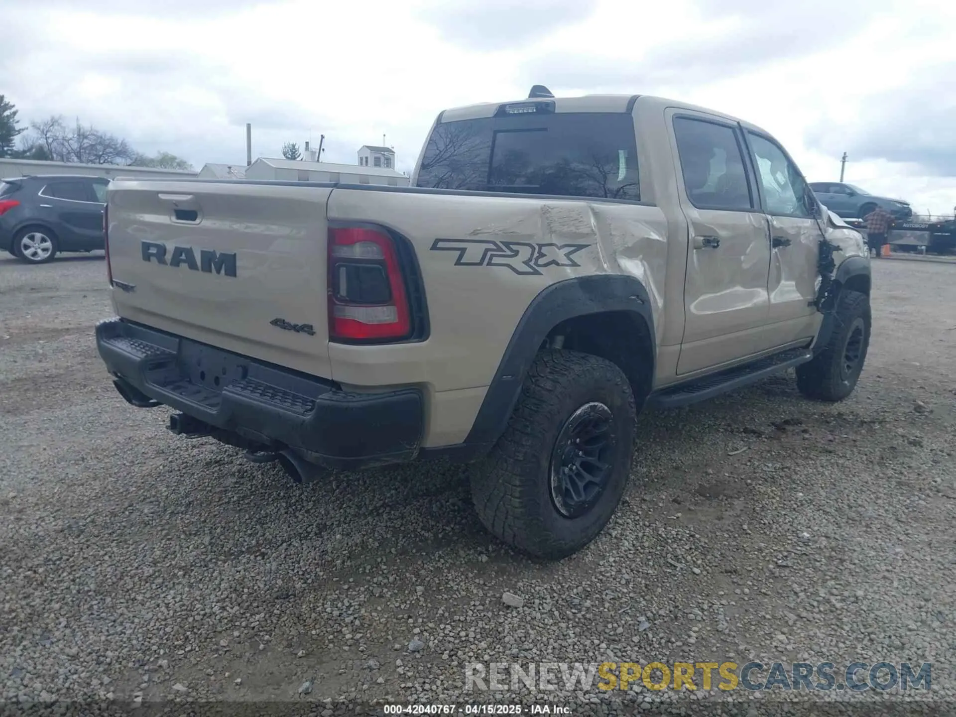 4 Photograph of a damaged car 1C6SRFU95NN399791 RAM 1500 2022