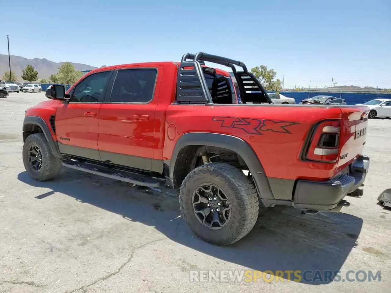 2 Photograph of a damaged car 1C6SRFU96NN364371 RAM 1500 2022