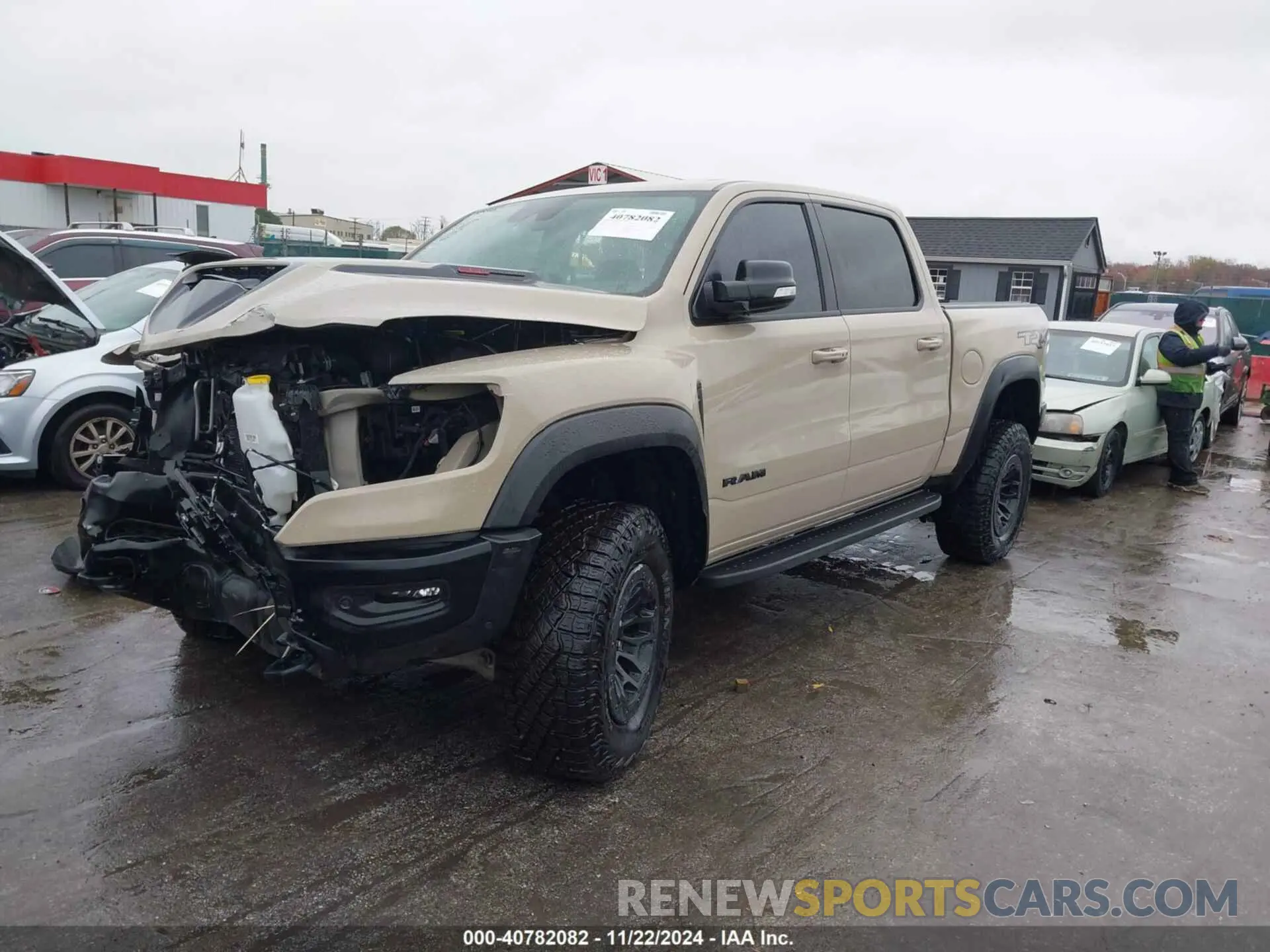 2 Photograph of a damaged car 1C6SRFU96NN404111 RAM 1500 2022