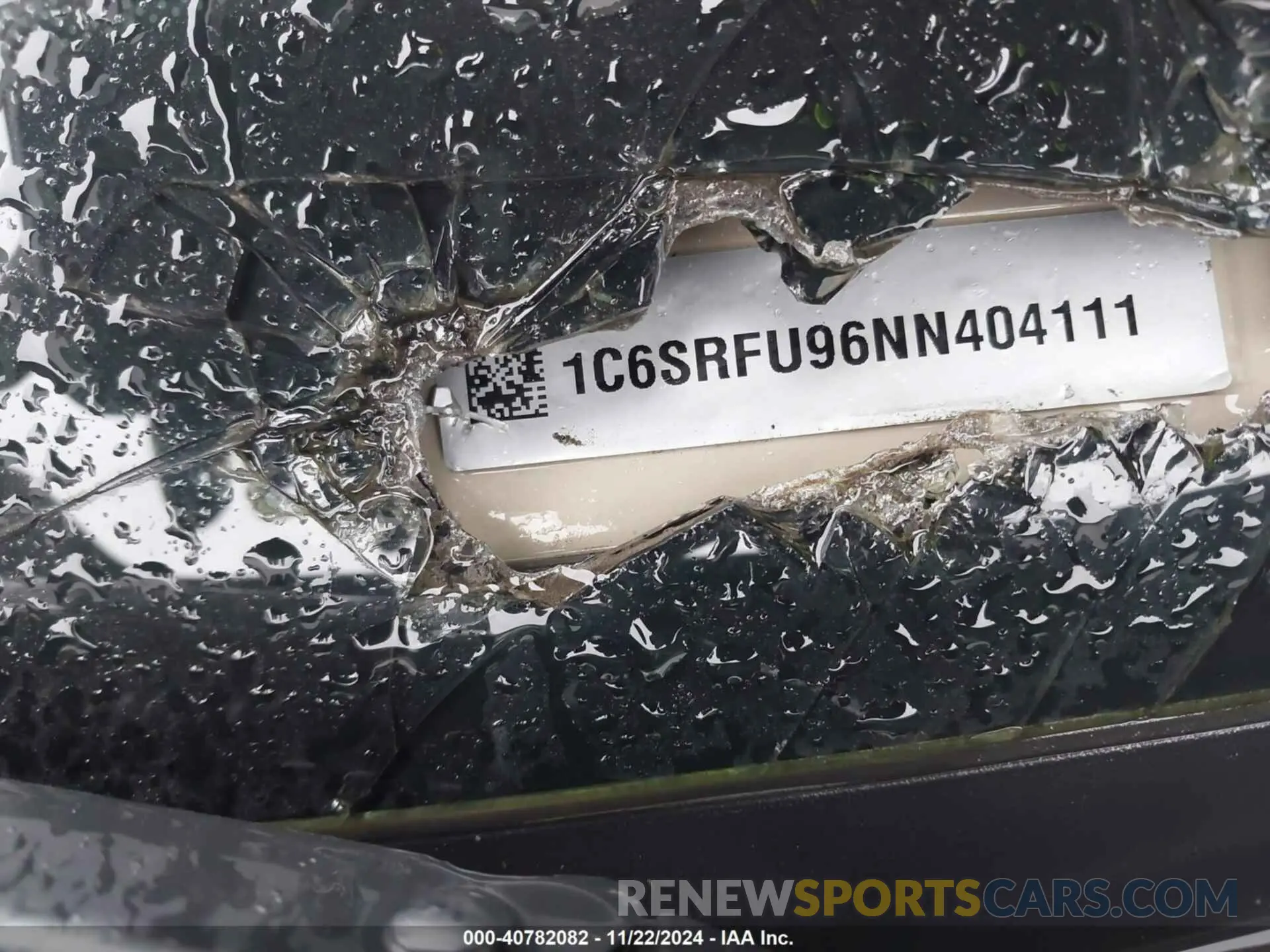 9 Photograph of a damaged car 1C6SRFU96NN404111 RAM 1500 2022