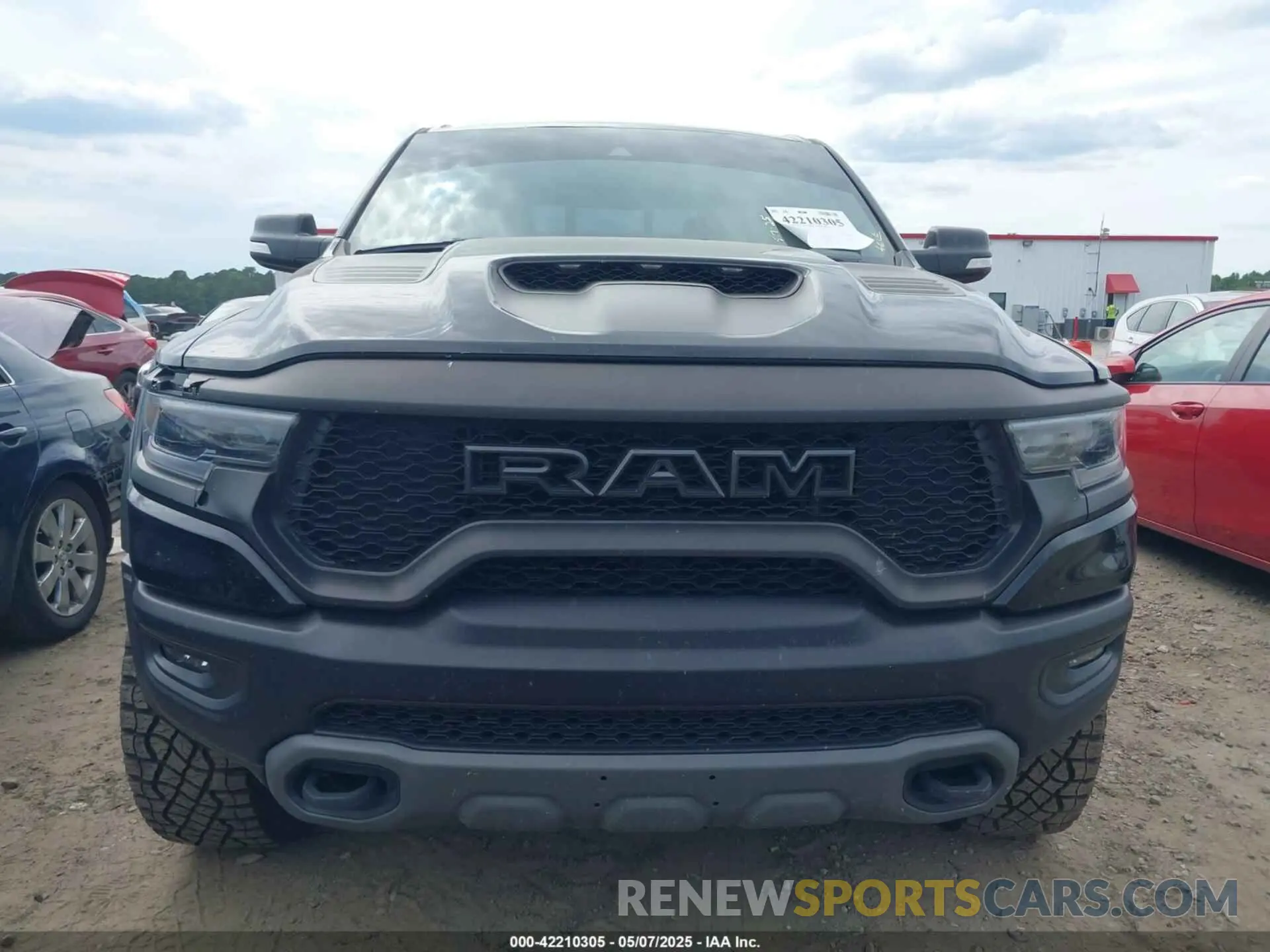 11 Photograph of a damaged car 1C6SRFU97NN112337 RAM 1500 2022