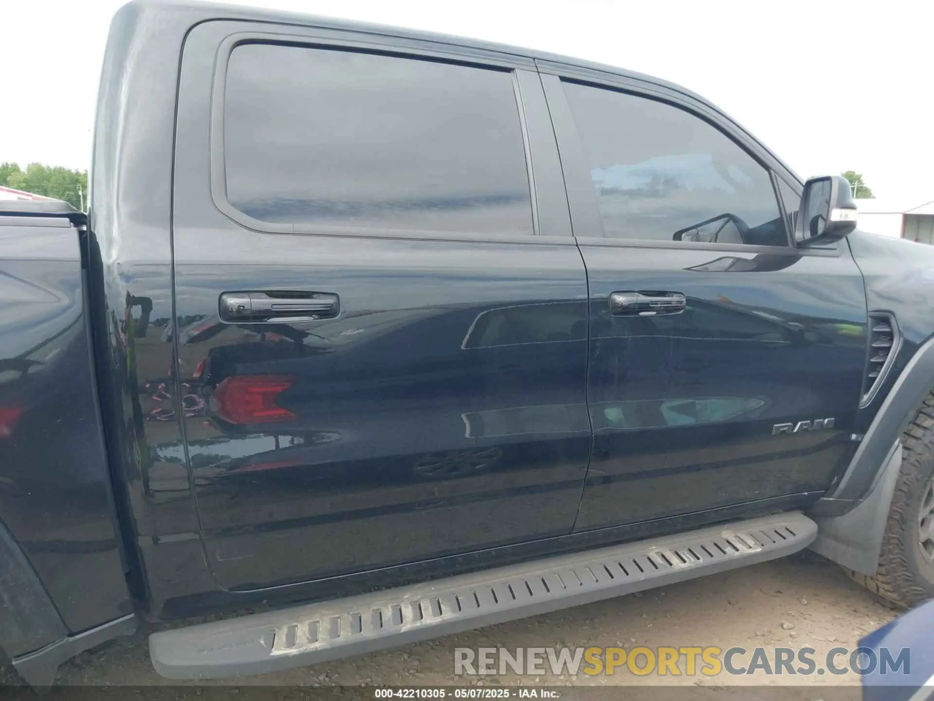 12 Photograph of a damaged car 1C6SRFU97NN112337 RAM 1500 2022
