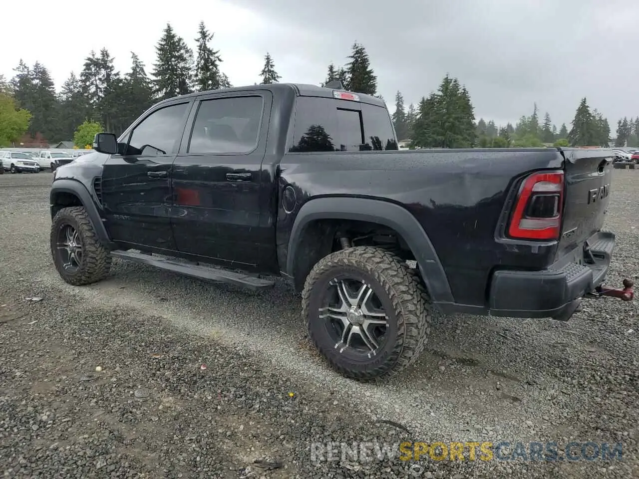 2 Photograph of a damaged car 1C6SRFU97NN215631 RAM 1500 2022