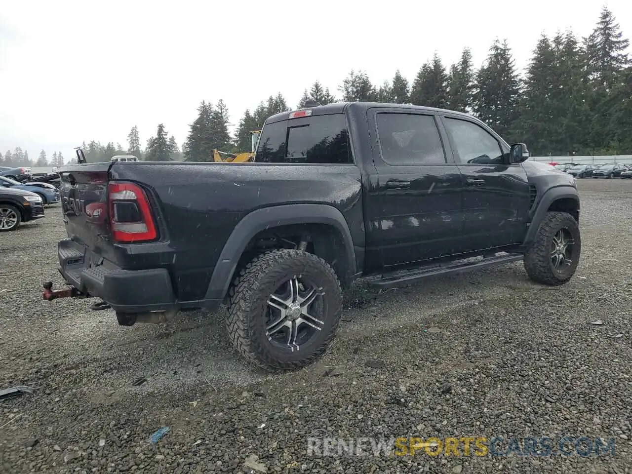 3 Photograph of a damaged car 1C6SRFU97NN215631 RAM 1500 2022