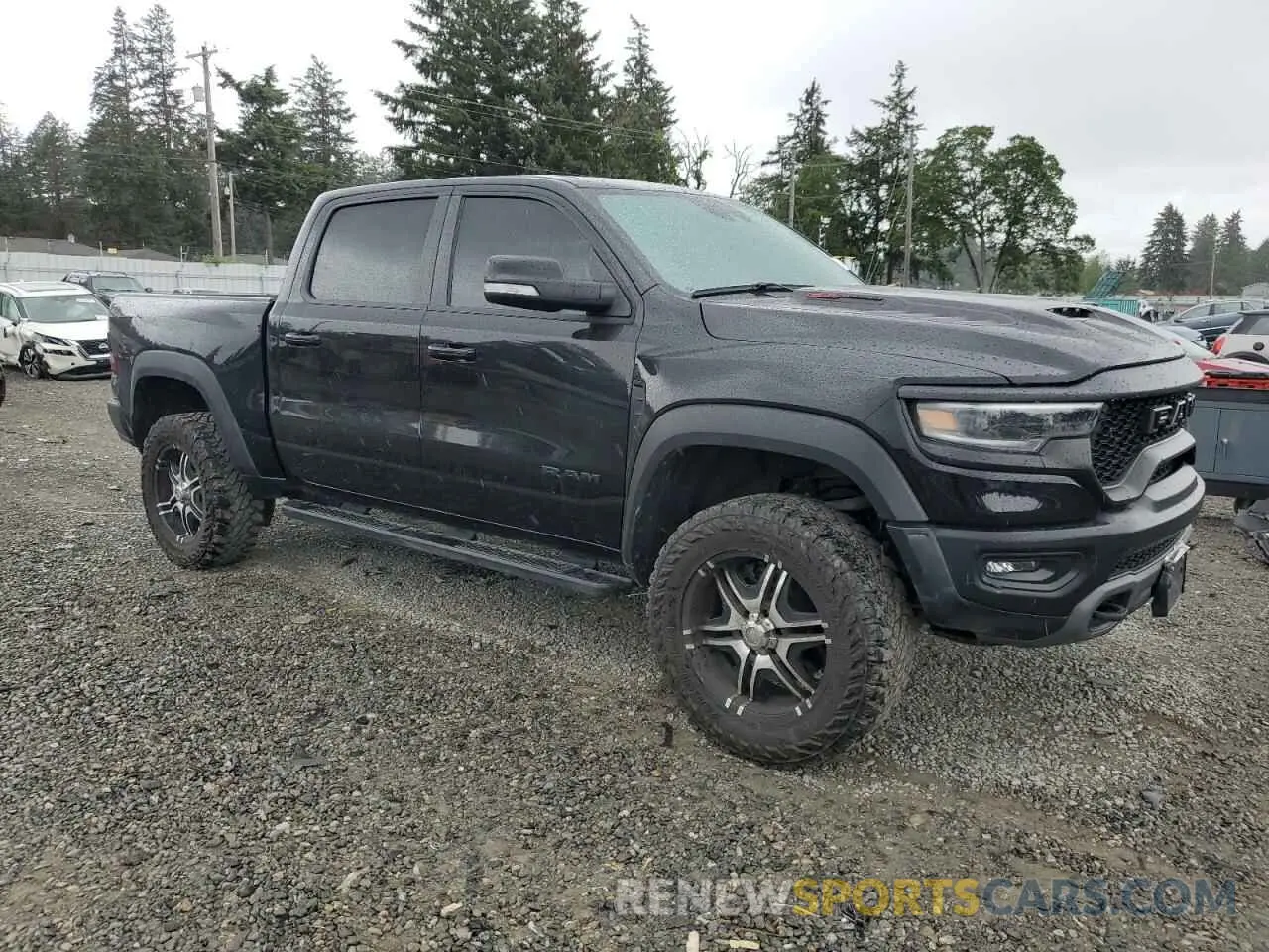 4 Photograph of a damaged car 1C6SRFU97NN215631 RAM 1500 2022