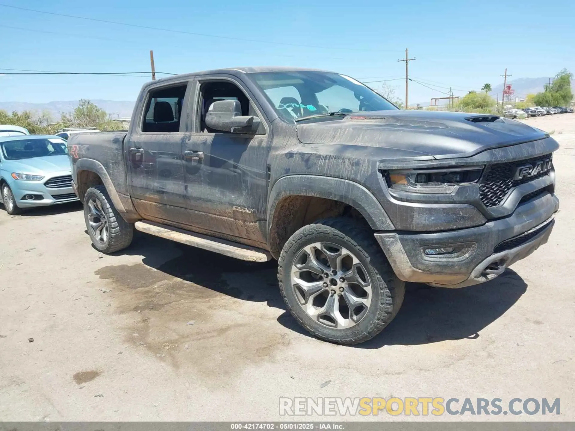 1 Photograph of a damaged car 1C6SRFU97NN353587 RAM 1500 2022