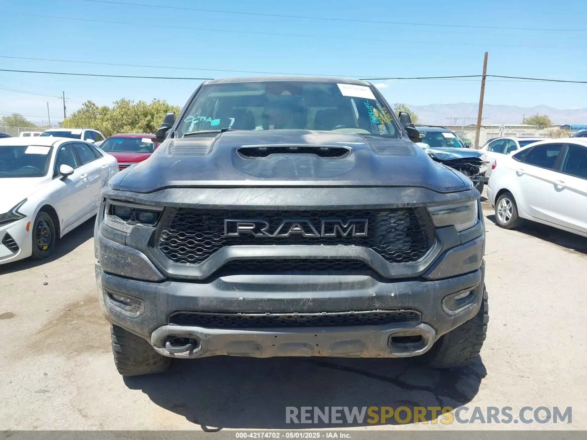 11 Photograph of a damaged car 1C6SRFU97NN353587 RAM 1500 2022