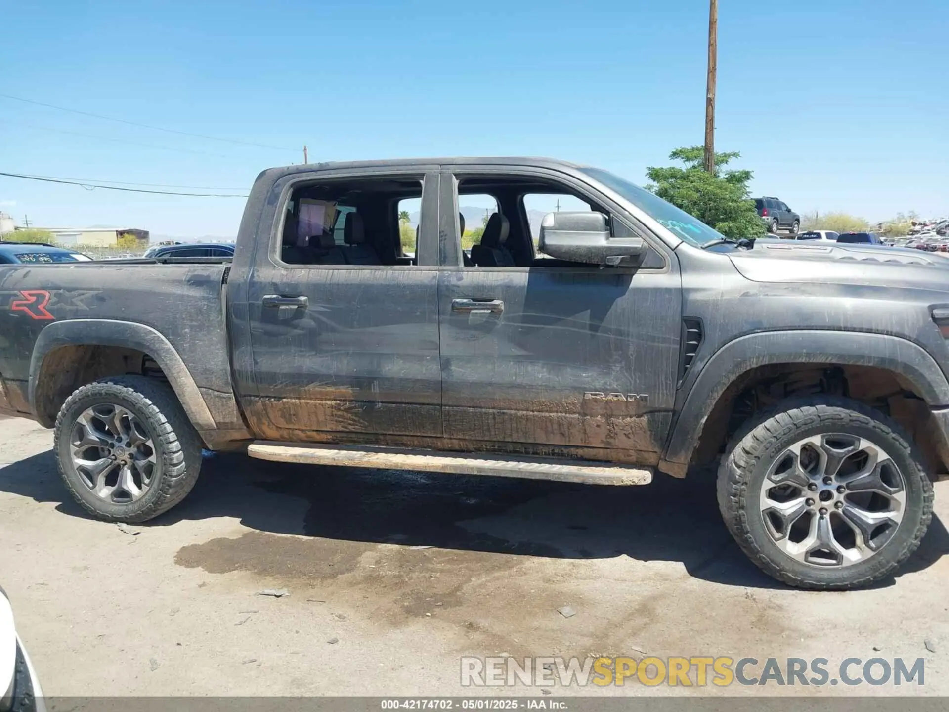 12 Photograph of a damaged car 1C6SRFU97NN353587 RAM 1500 2022