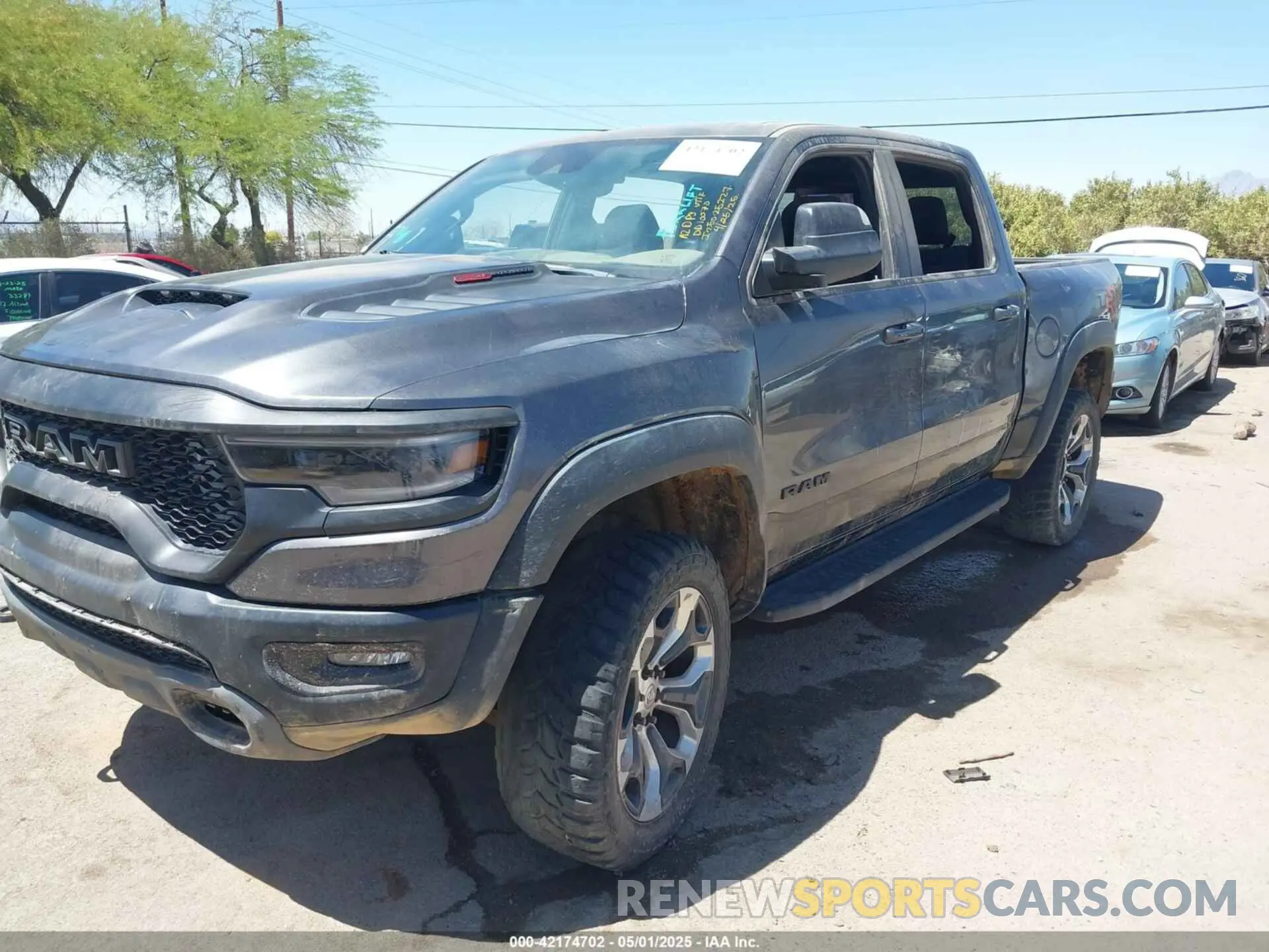 2 Photograph of a damaged car 1C6SRFU97NN353587 RAM 1500 2022