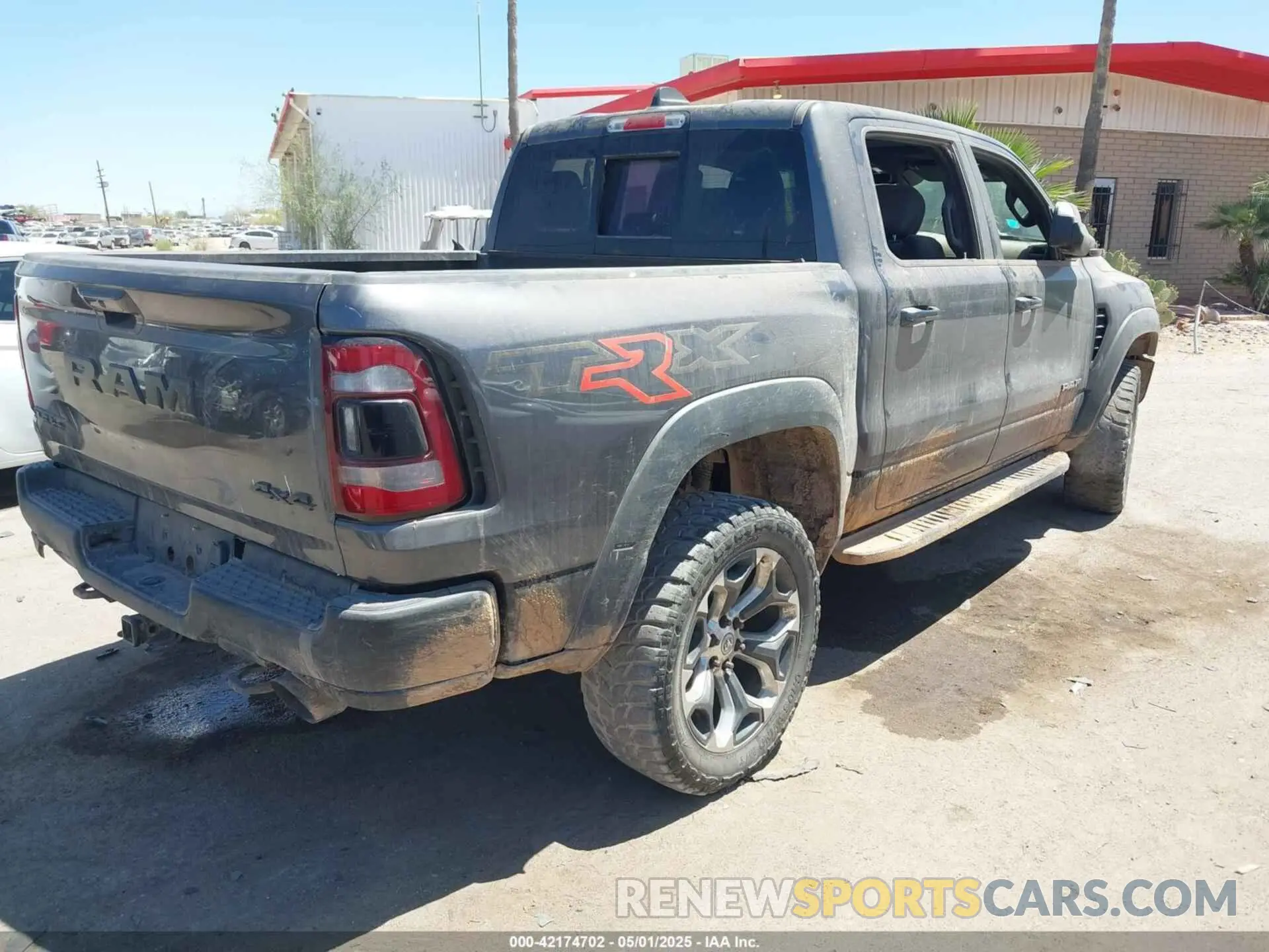 4 Photograph of a damaged car 1C6SRFU97NN353587 RAM 1500 2022