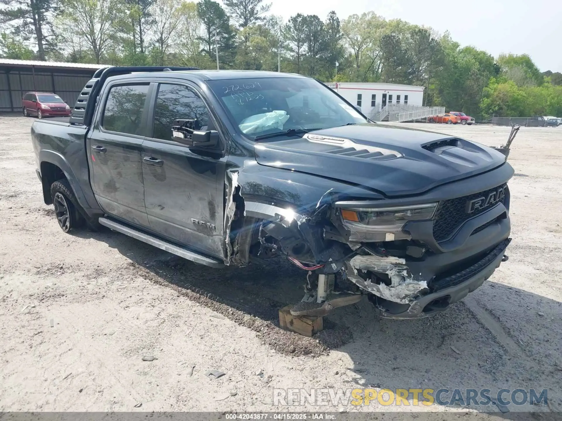 1 Photograph of a damaged car 1C6SRFU98NN272629 RAM 1500 2022
