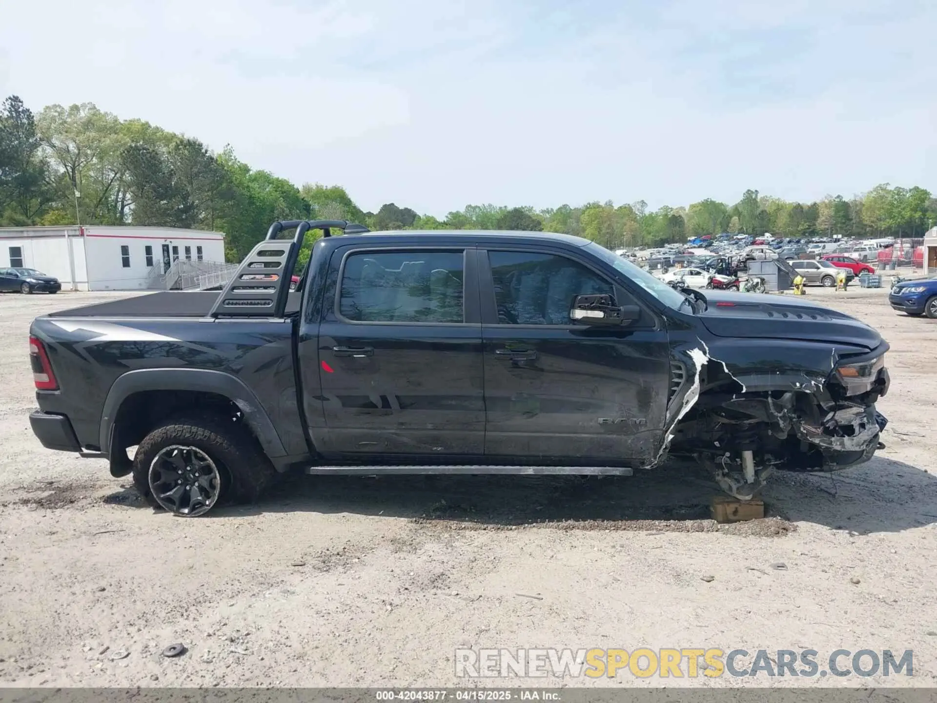 13 Photograph of a damaged car 1C6SRFU98NN272629 RAM 1500 2022