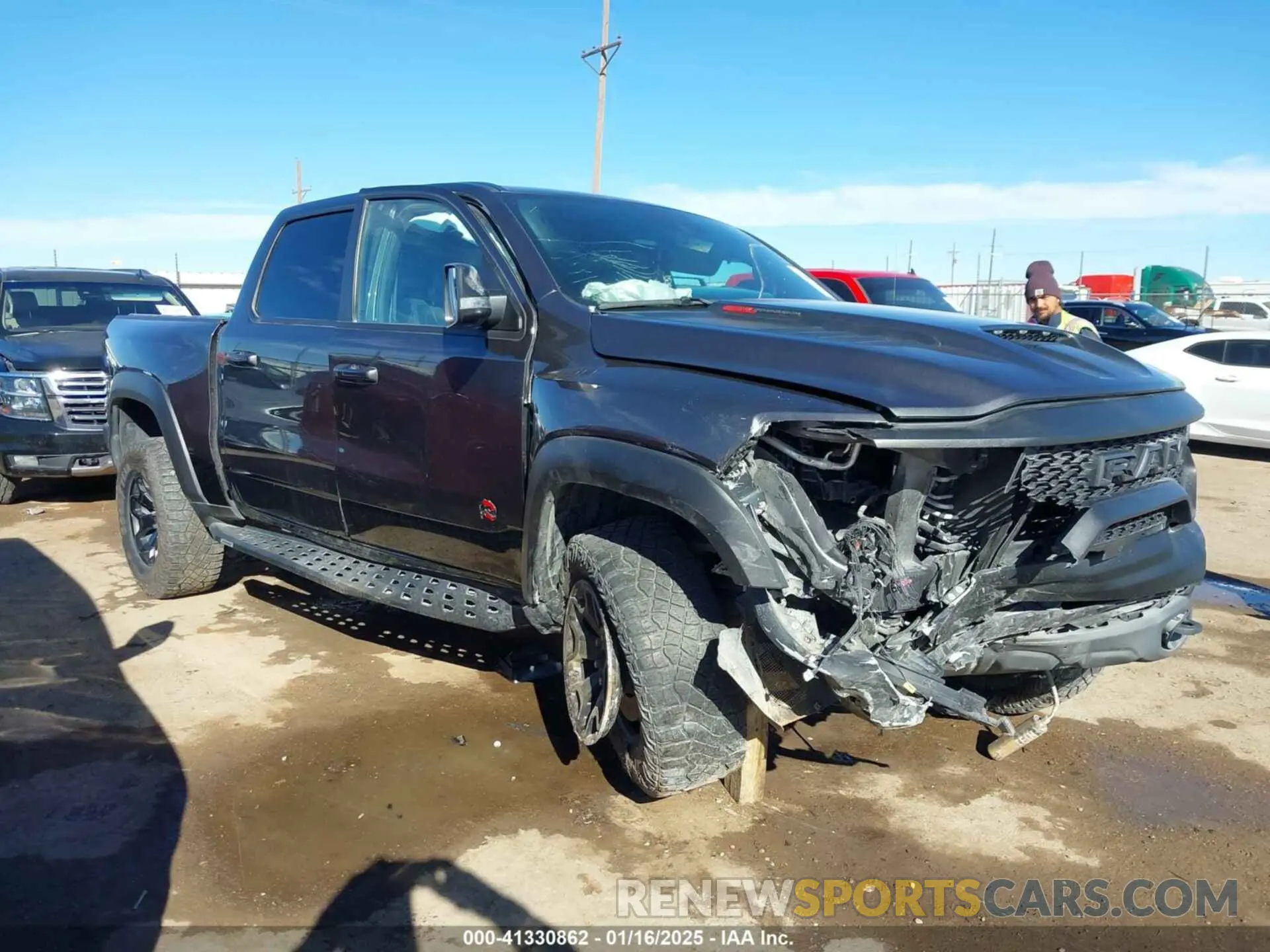 1 Photograph of a damaged car 1C6SRFU98NN377235 RAM 1500 2022