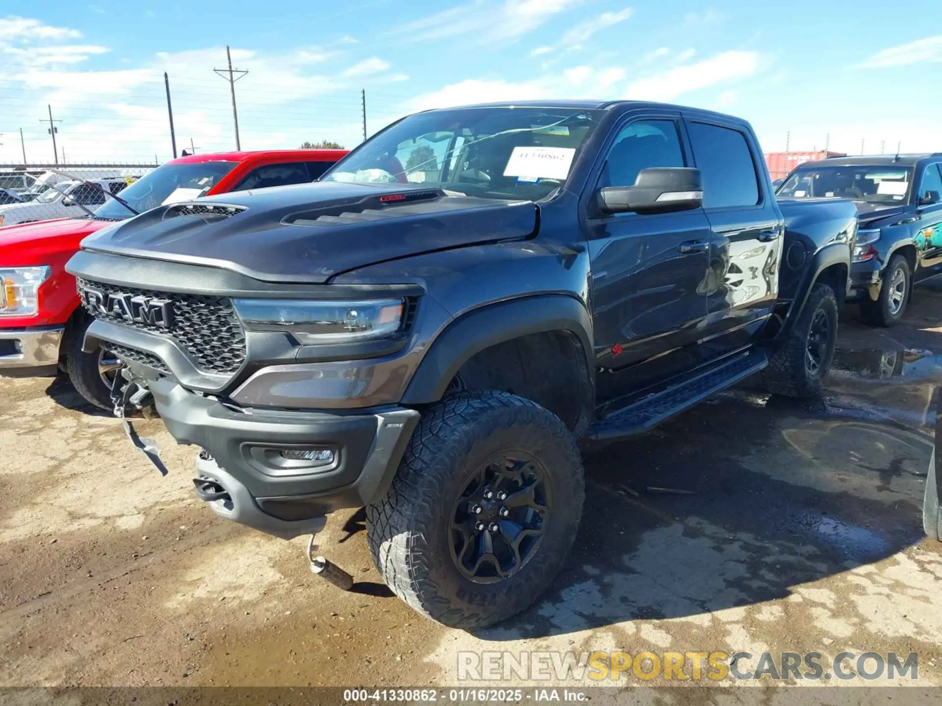 2 Photograph of a damaged car 1C6SRFU98NN377235 RAM 1500 2022