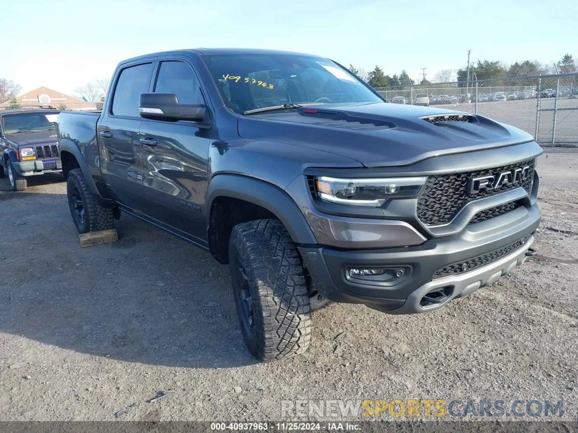 1 Photograph of a damaged car 1C6SRFU99NN144769 RAM 1500 2022