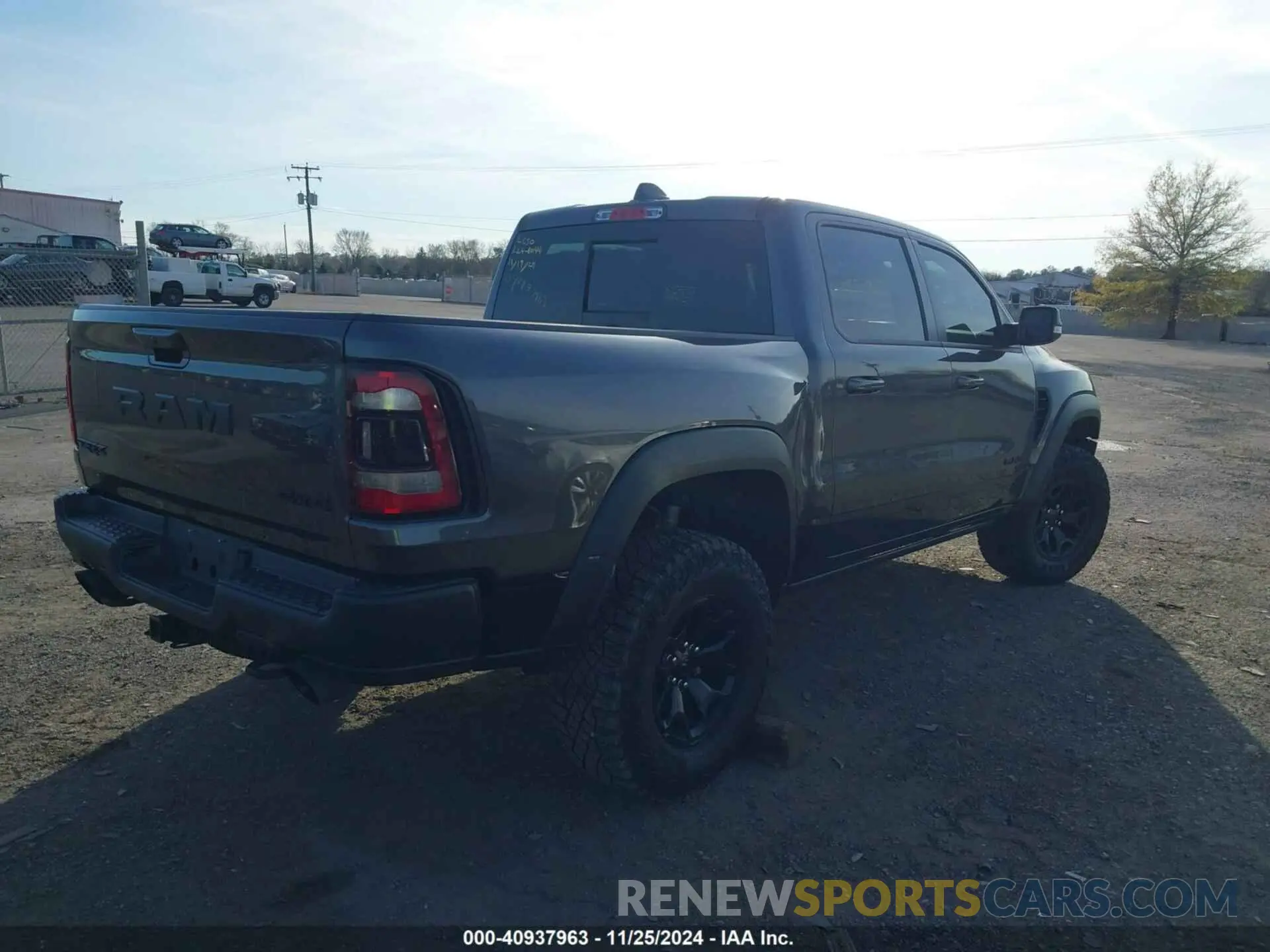 4 Photograph of a damaged car 1C6SRFU99NN144769 RAM 1500 2022