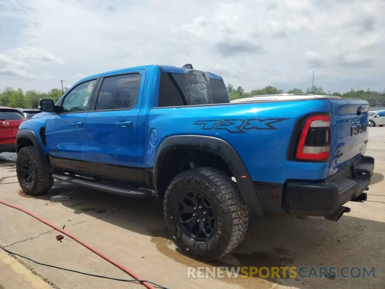 2 Photograph of a damaged car 1C6SRFU99NN147798 RAM 1500 2022