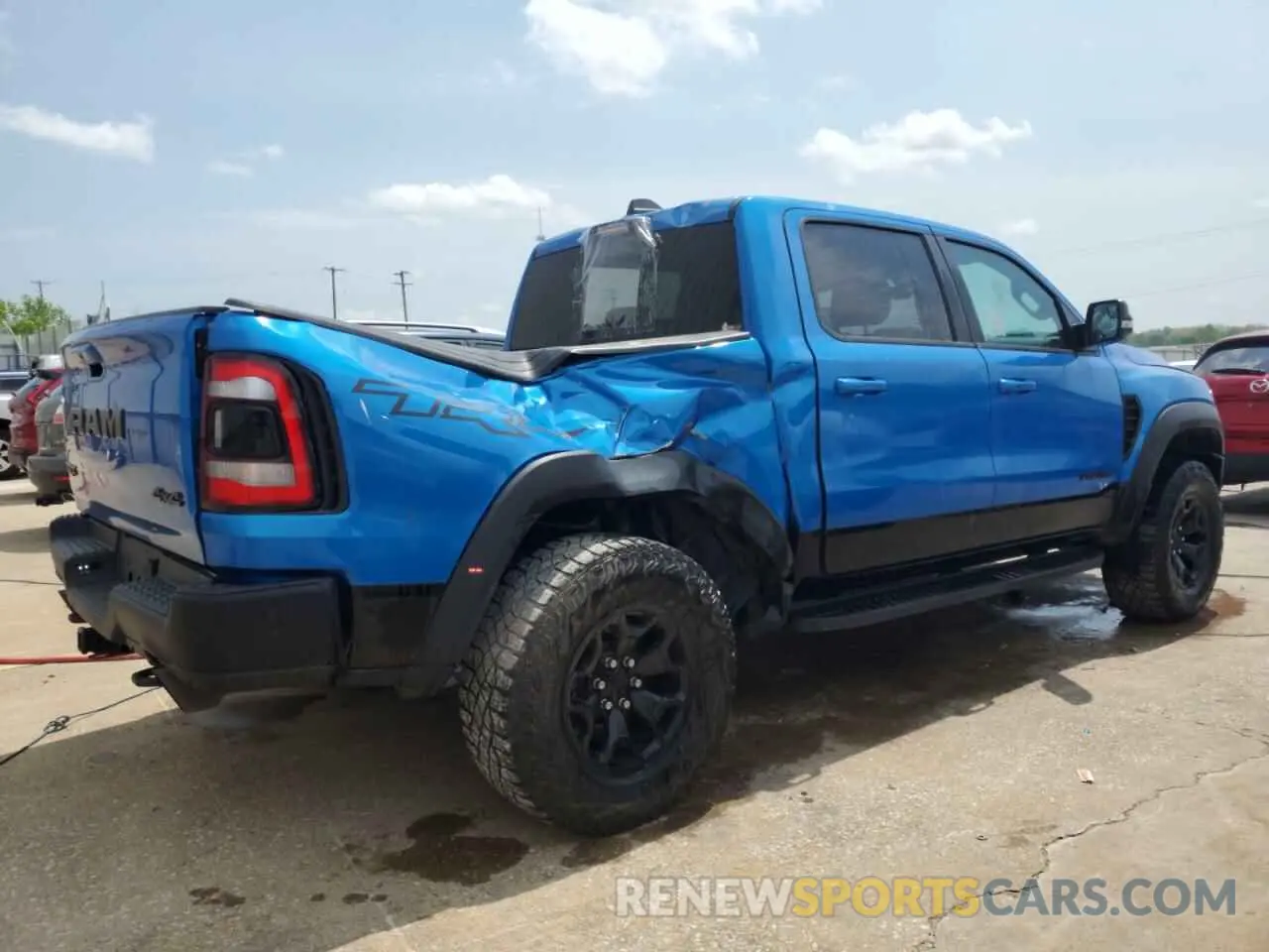 3 Photograph of a damaged car 1C6SRFU99NN147798 RAM 1500 2022