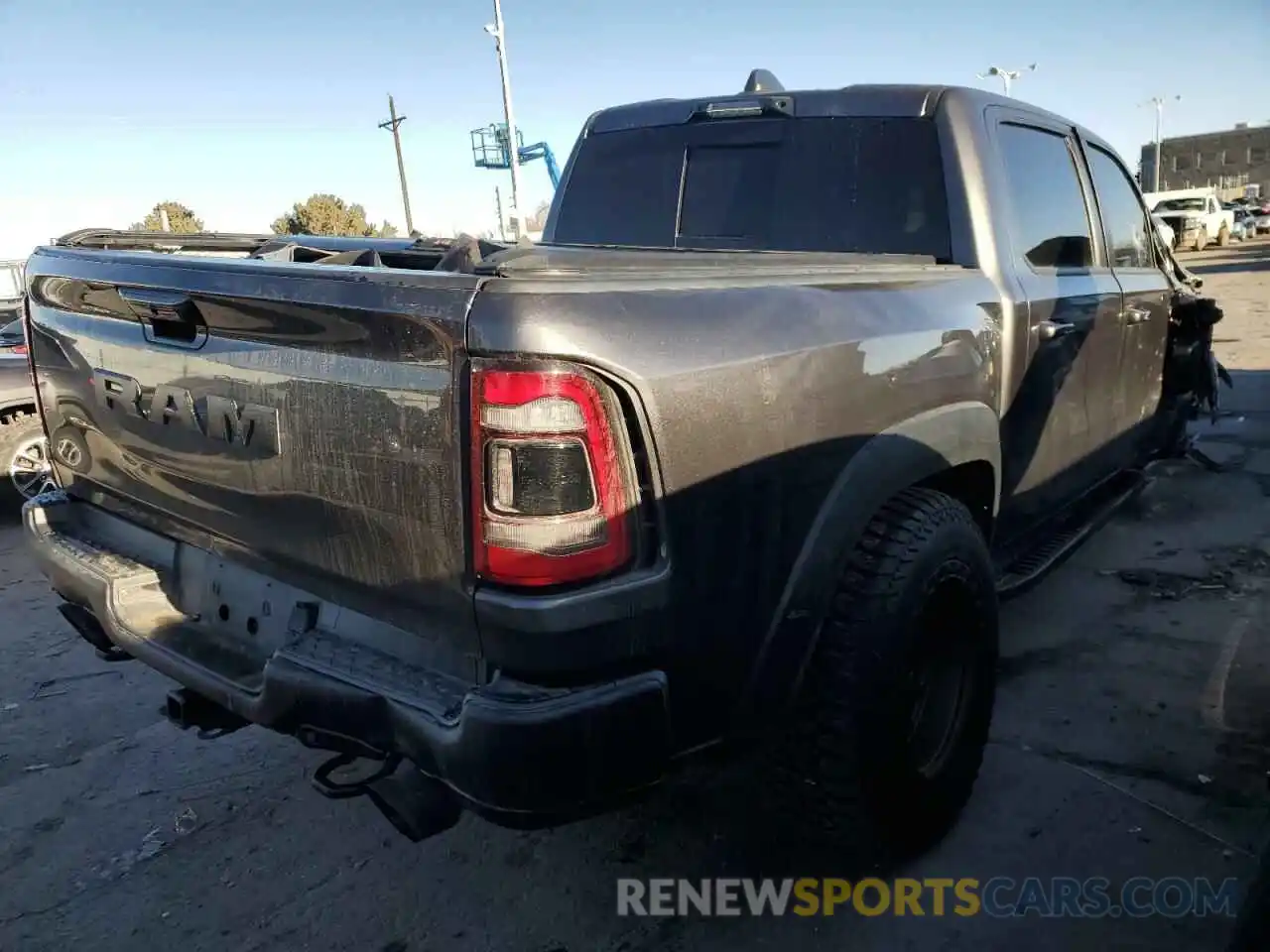 3 Photograph of a damaged car 1C6SRFU99NN303922 RAM 1500 2022