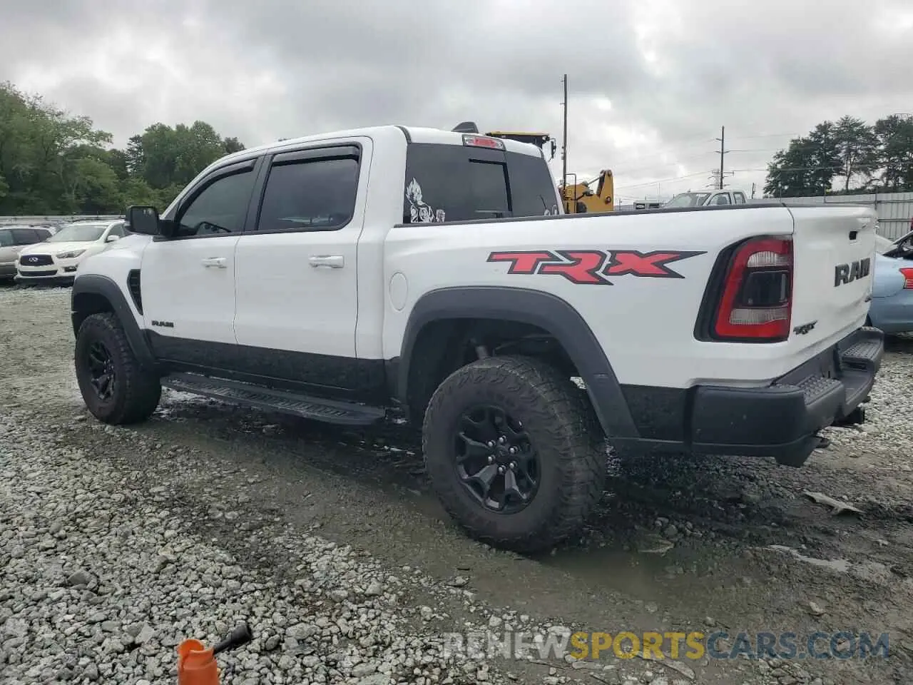 2 Photograph of a damaged car 1C6SRFU99NN318694 RAM 1500 2022