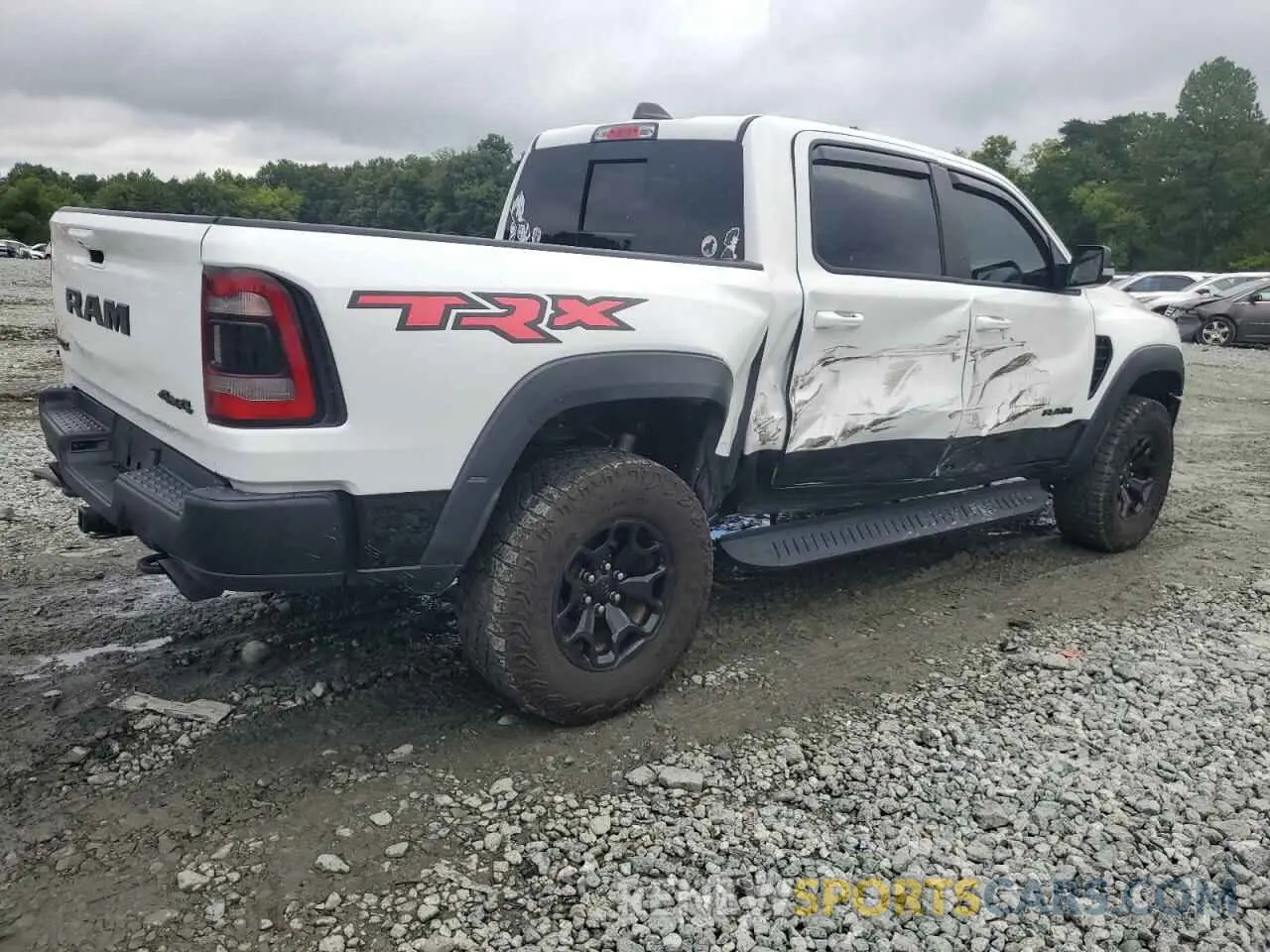 3 Photograph of a damaged car 1C6SRFU99NN318694 RAM 1500 2022