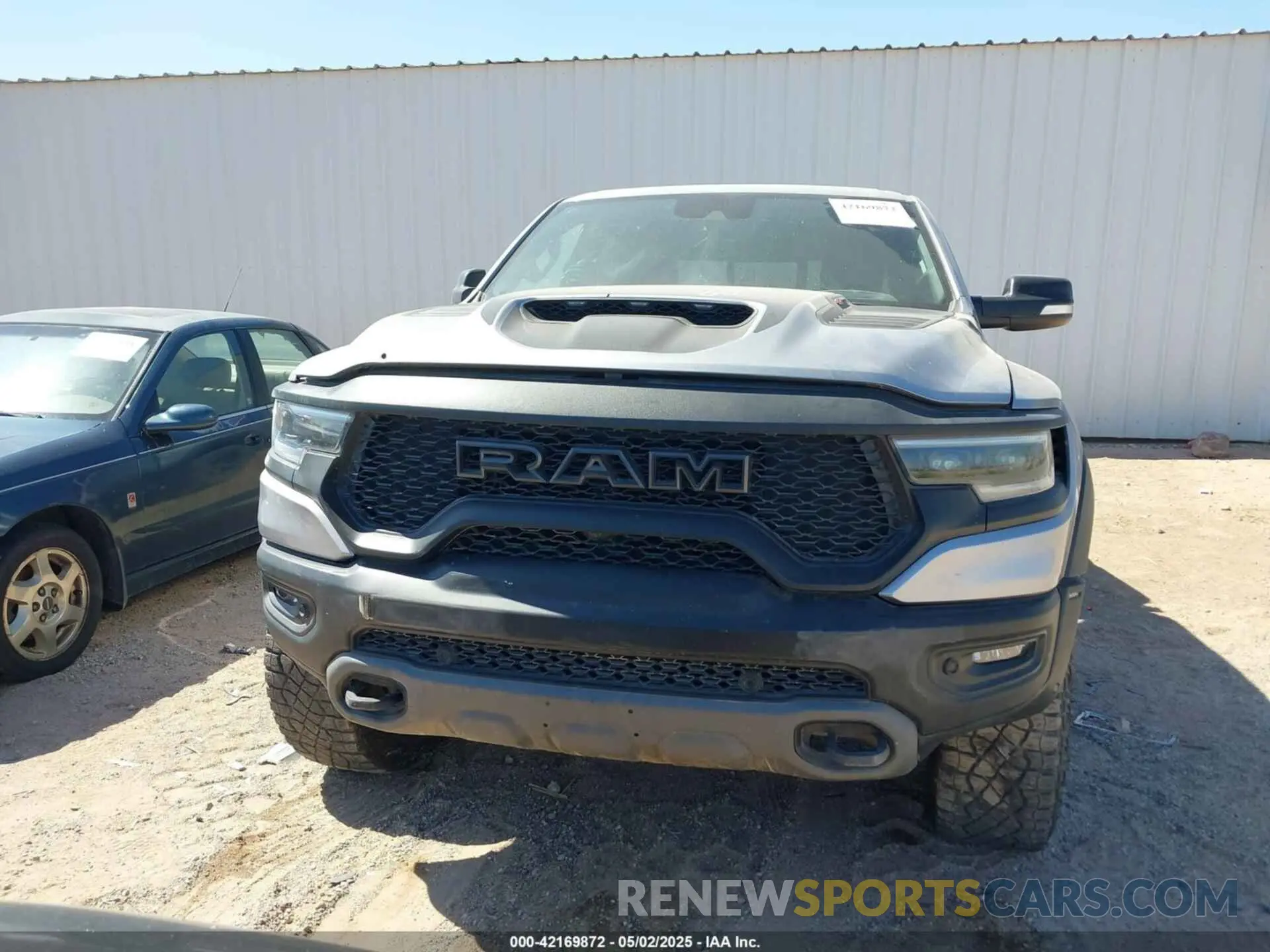 11 Photograph of a damaged car 1C6SRFU99NN357351 RAM 1500 2022