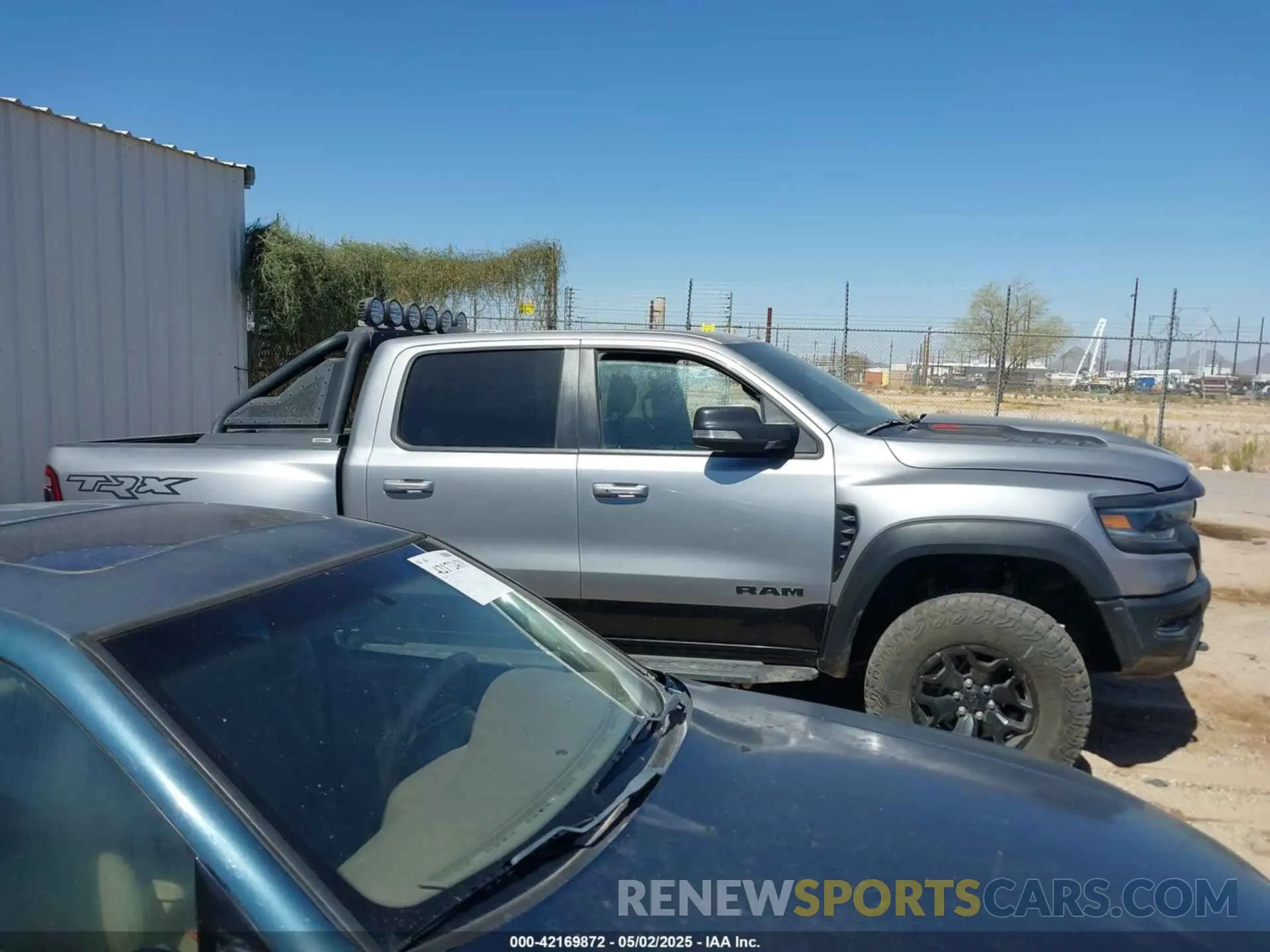 12 Photograph of a damaged car 1C6SRFU99NN357351 RAM 1500 2022