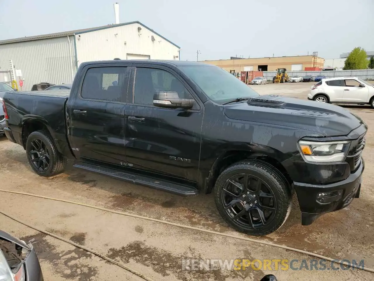 4 Photograph of a damaged car 1C6SRFVT3NN105721 RAM 1500 2022