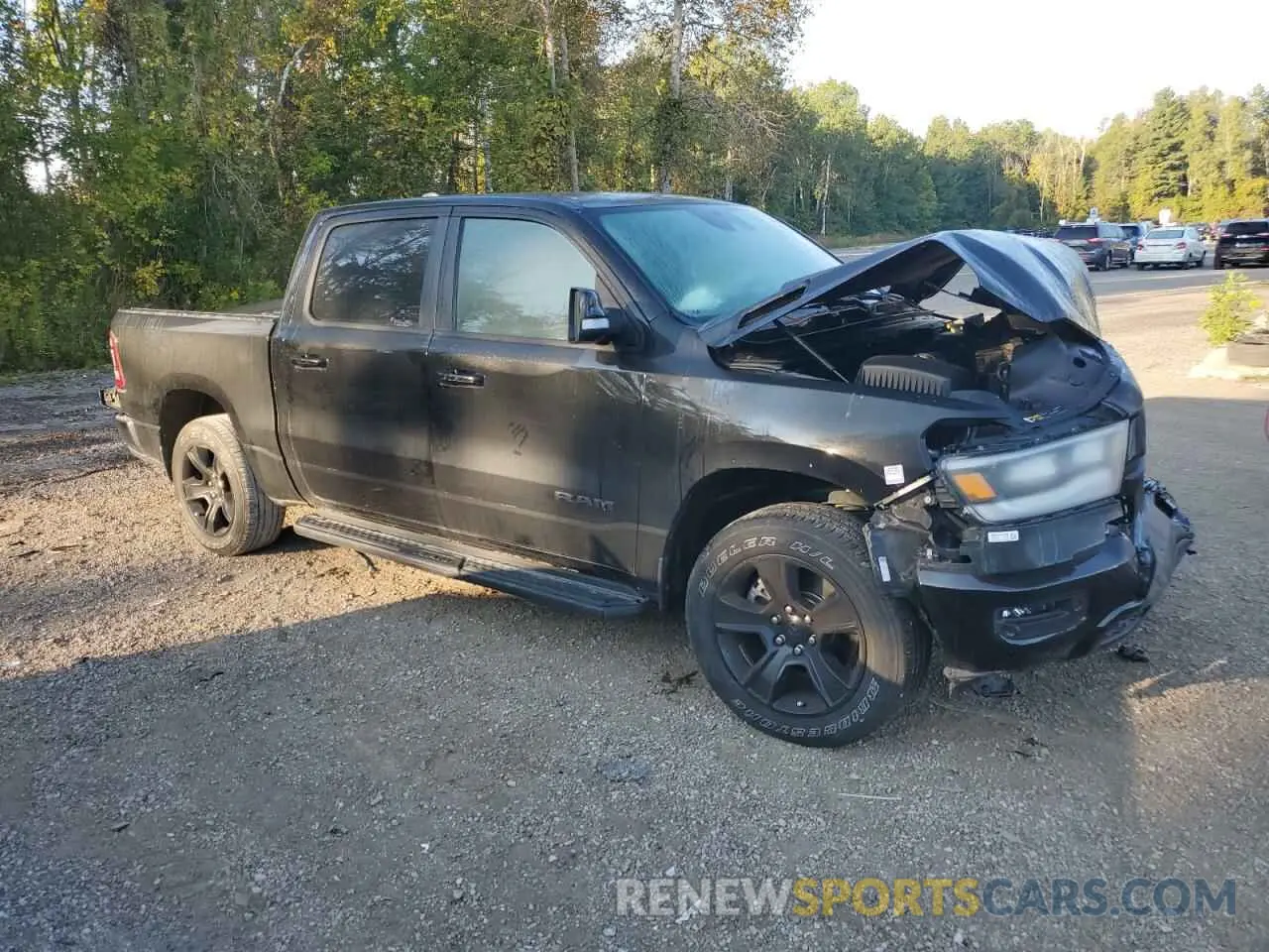 4 Photograph of a damaged car 1C6SRFVT5NN326432 RAM 1500 2022