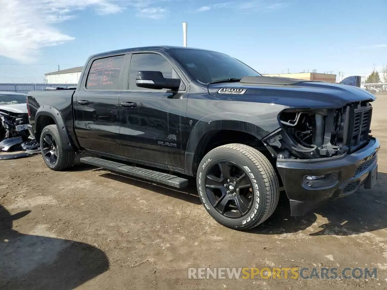 4 Photograph of a damaged car 1C6SRFVT5NN338550 RAM 1500 2022