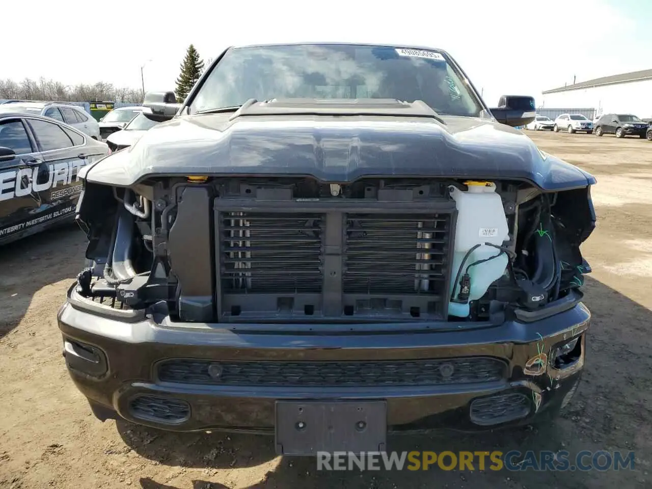 5 Photograph of a damaged car 1C6SRFVT5NN338550 RAM 1500 2022