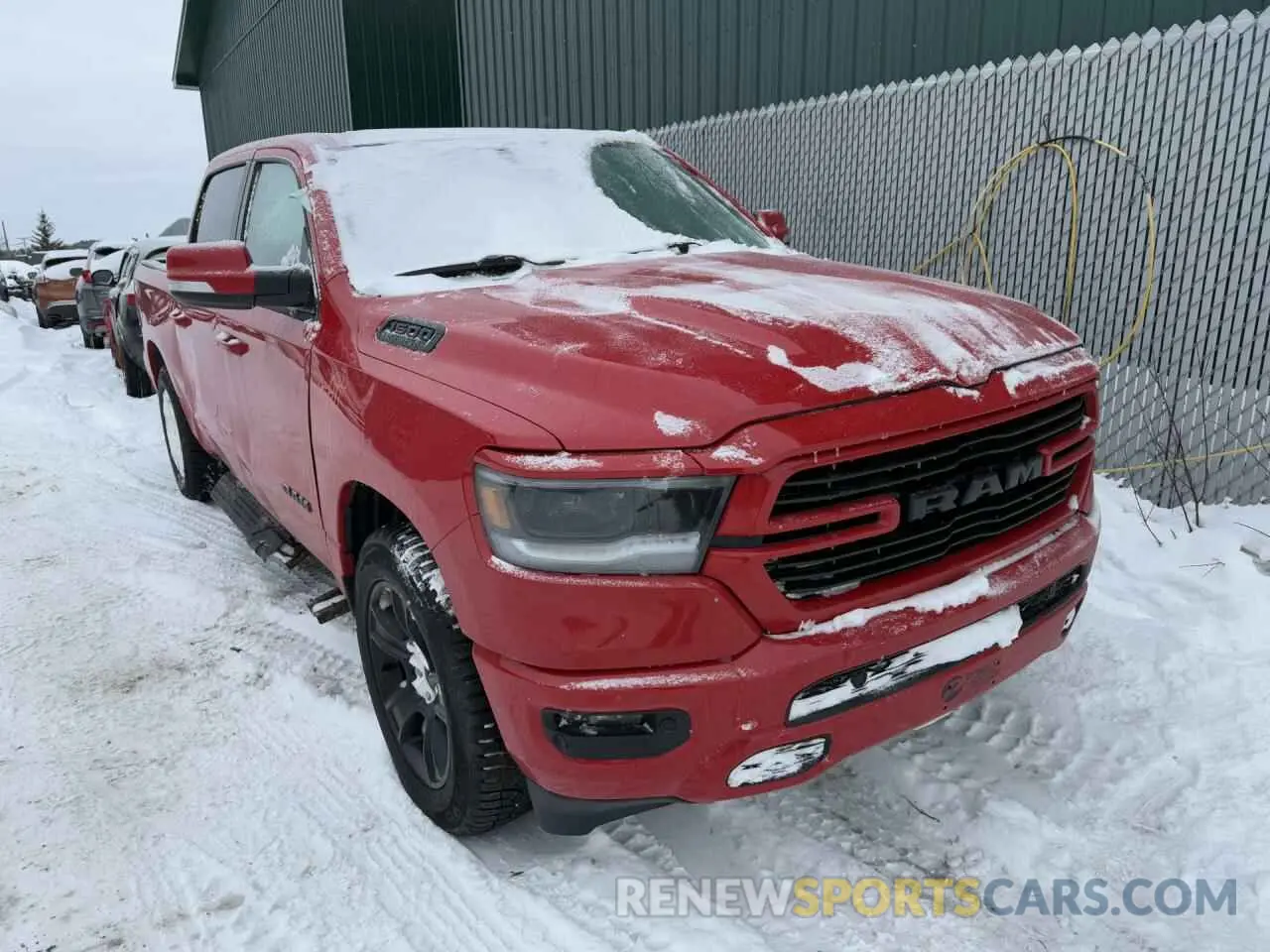 4 Photograph of a damaged car 1C6SRFVT9NN312744 RAM 1500 2022