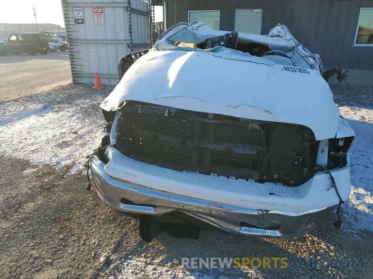 5 Photograph of a damaged car 3C6JR7DG0NG428493 RAM 1500 2022