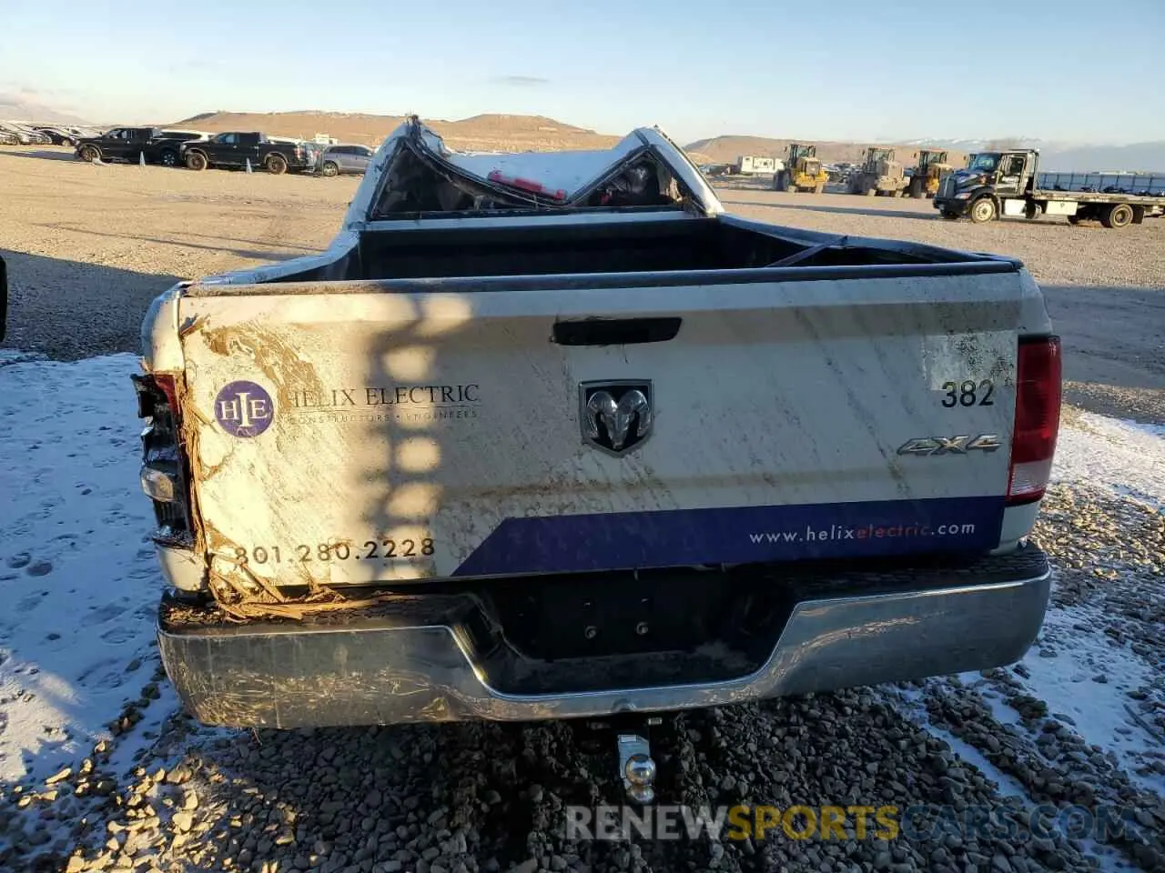 6 Photograph of a damaged car 3C6JR7DG0NG428493 RAM 1500 2022